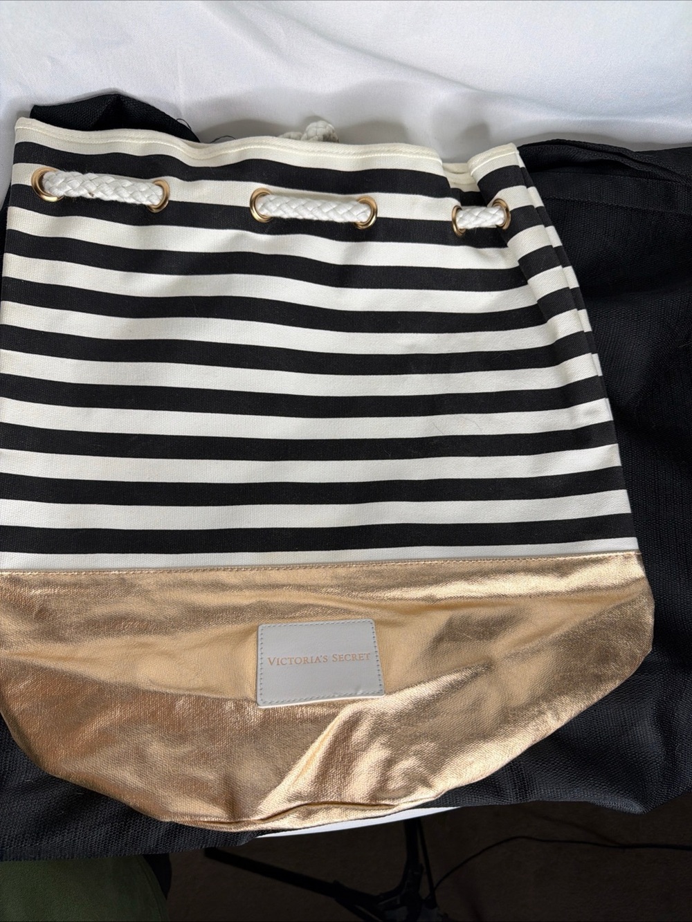 Victoria's Secret White Patch on Metallic Gold Fabric